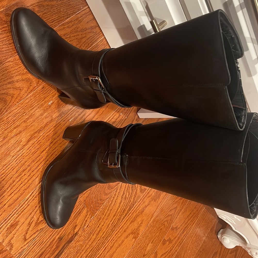 Black high heeled boots. Fleece lined boot. Perfect for cold days! Barely used.